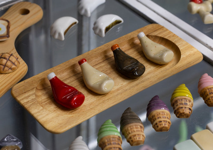 Kitagawa Bisen porcelain chopstick rests shaped like mayonnaise, ketchup, and sauce bottles