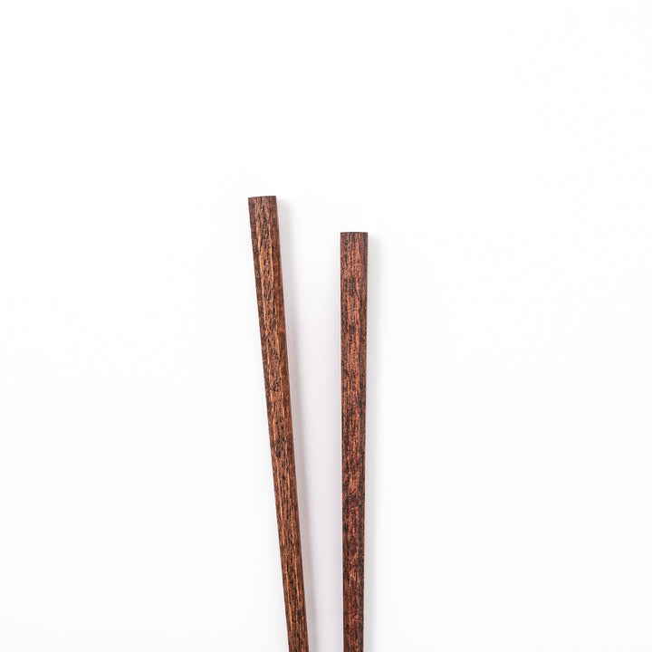 Octagonal natural wood Japanese chopsticks with a textured grip at the tips specifically designed for eating ramen noodles