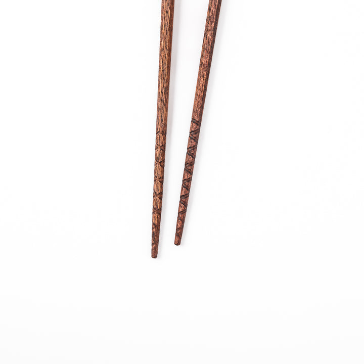 Octagonal natural wood Japanese chopsticks with a textured grip at the tips specifically designed for eating ramen noodles