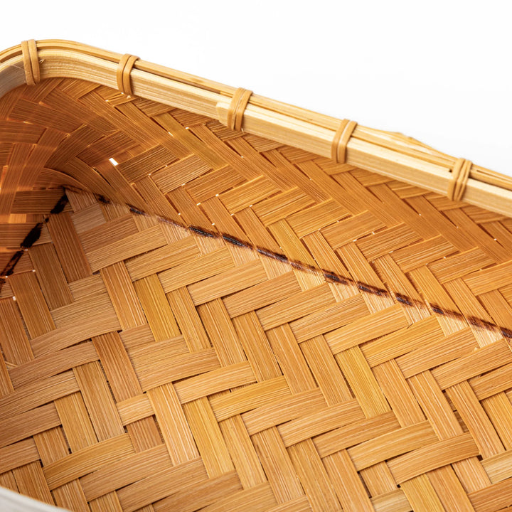 Close up of handcrafted Japanese Ajiro weave bamboo showing the detailed natural texture and authentic artisan skill
