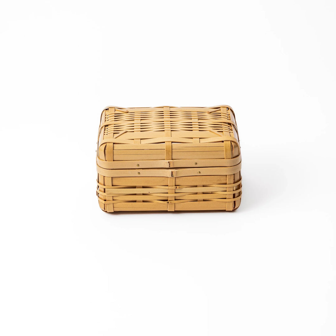 Handcrafted Japanese Hishigi weave bamboo bento basket with lid showing natural flattened bamboo textures