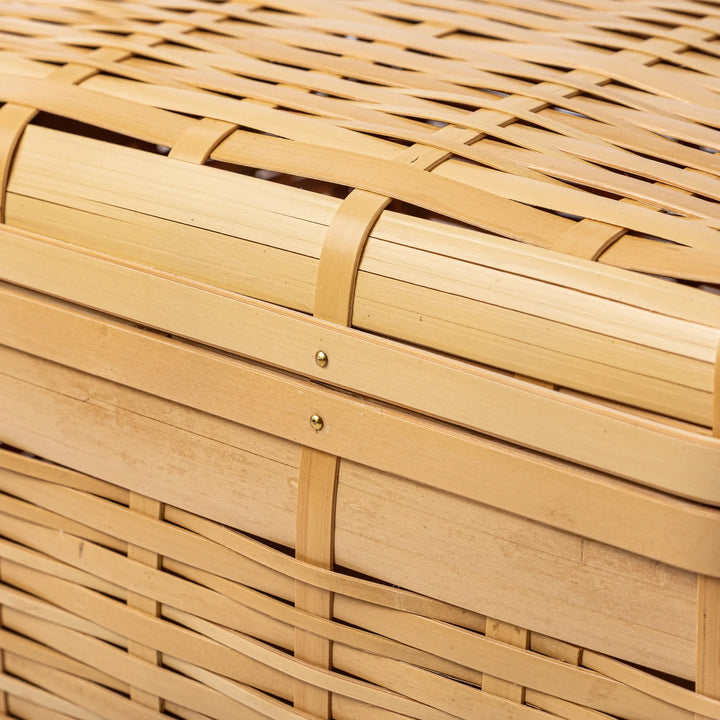 Close up of handcrafted Japanese bamboo basket showing the detailed weave pattern and natural structural durability