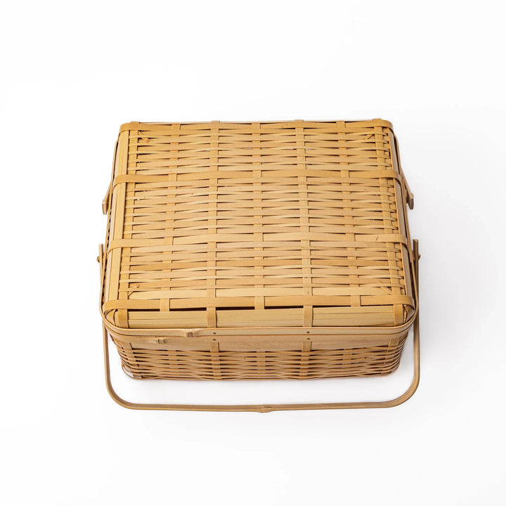 Close up of handcrafted Japanese bamboo basket showing the detailed weave pattern and natural structural durability