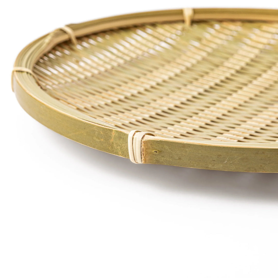 Traditional flat Japanese bamboo zaru strainer basket for serving cold soba noodles or rinsing vegetables