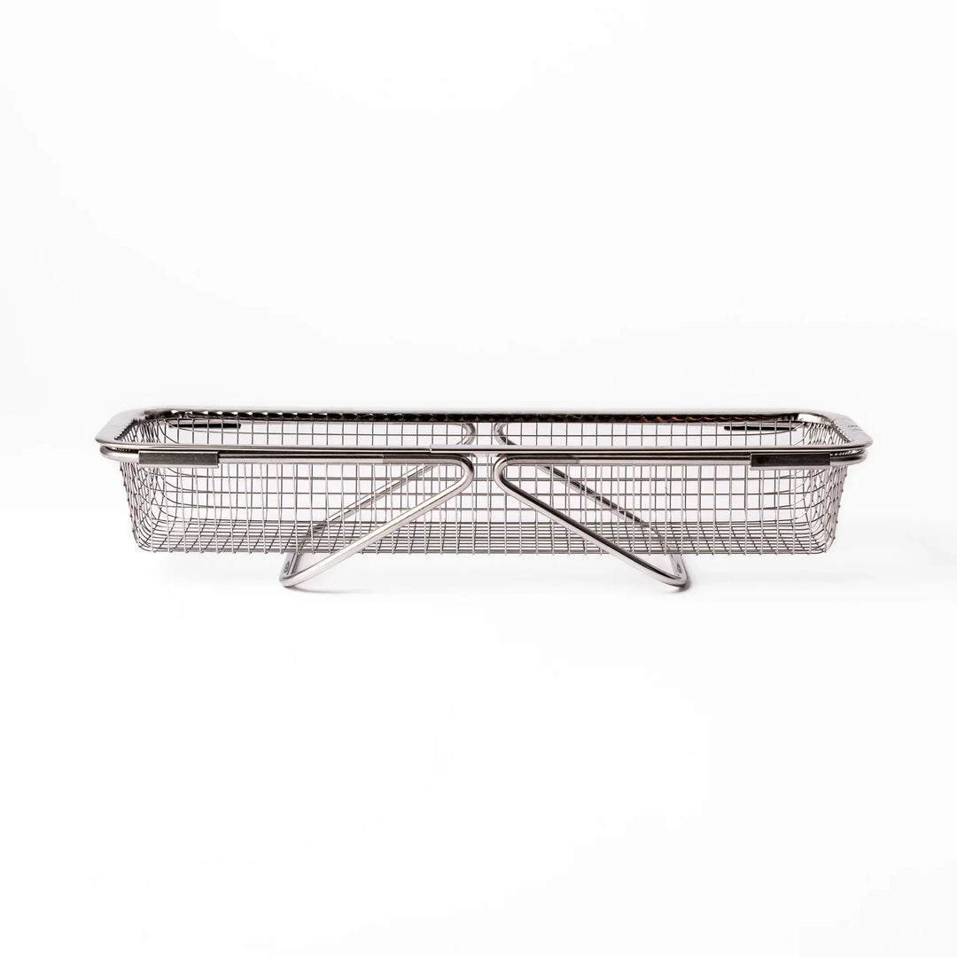 Stainless steel rectangular strainer basket with handles for draining noodles or frying in Japanese cooking.