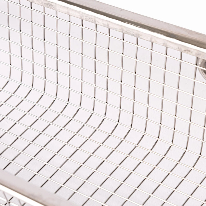Stainless steel rectangular strainer basket with handles for draining noodles or frying in Japanese cooking.
