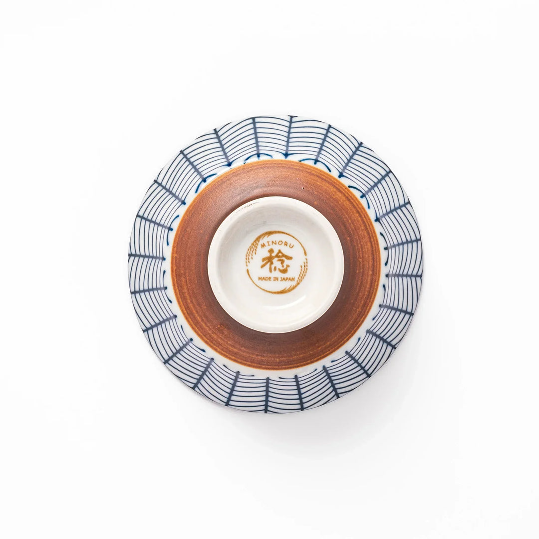 Japanese porcelain rice bowl with indigo arrow feather pattern and terracotta base, handcrafted in traditional style.