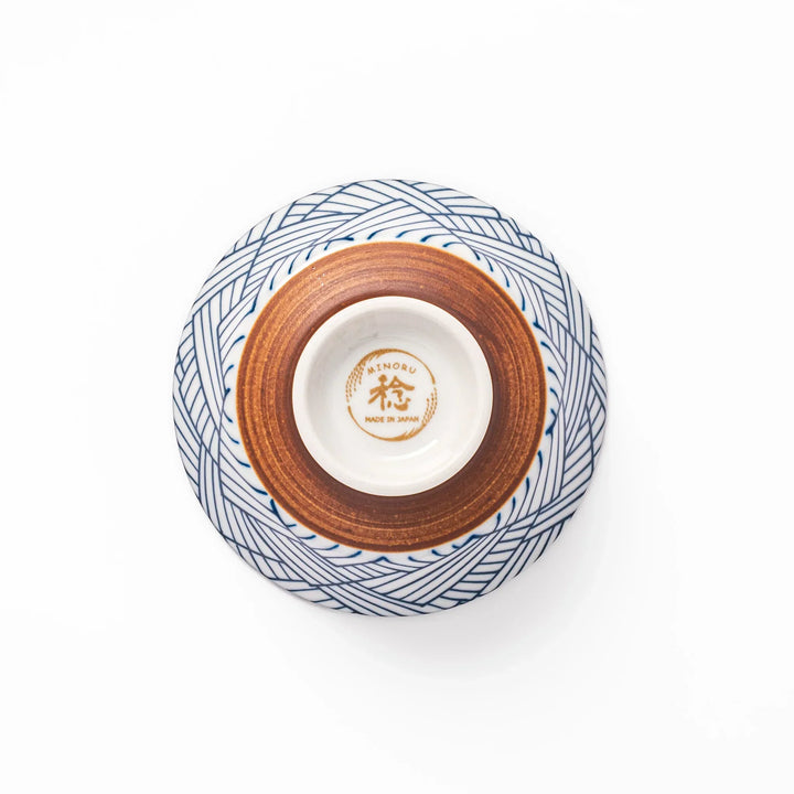 Japanese porcelain rice bowl with indigo basket weave pattern and terracotta base, crafted in traditional style.