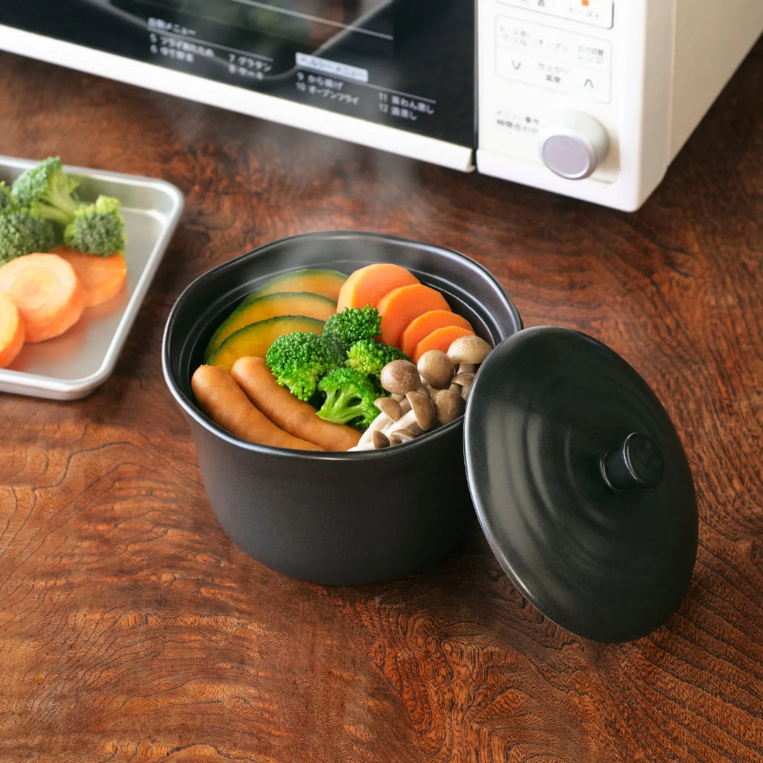 Two tone Japanese ceramic rice storage bowl with lid glazed top and textured brown base for rustic charm.