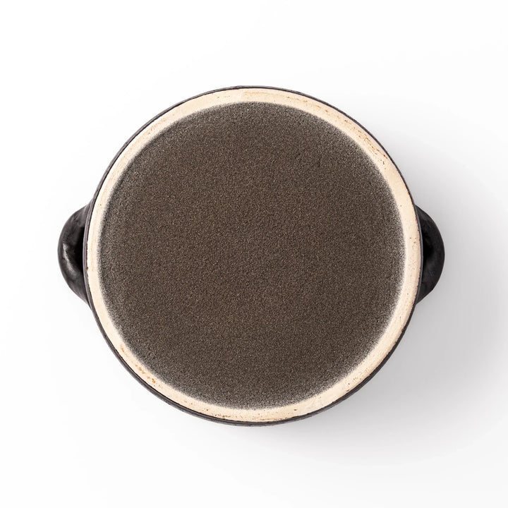 Black clay donabe with induction-compatible design, featuring double lid and side handles, ideal for cooking 2 cups of rice.