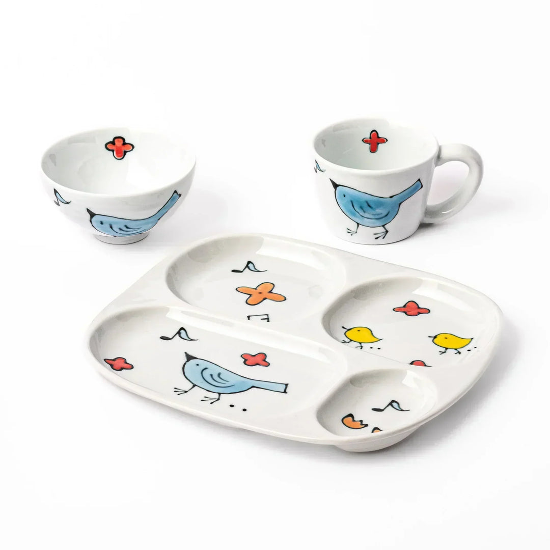 Blue Bird Kids Dinnerware Set with divided plate, rice bowl, and mug, decorated with cheerful bird motifs.