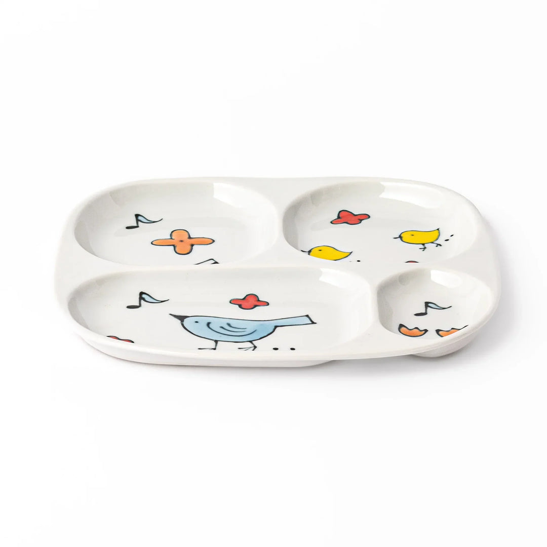Children’s divided plate with blue and yellow birds, flowers, and notes, designed for fun, easy mealtime organization.