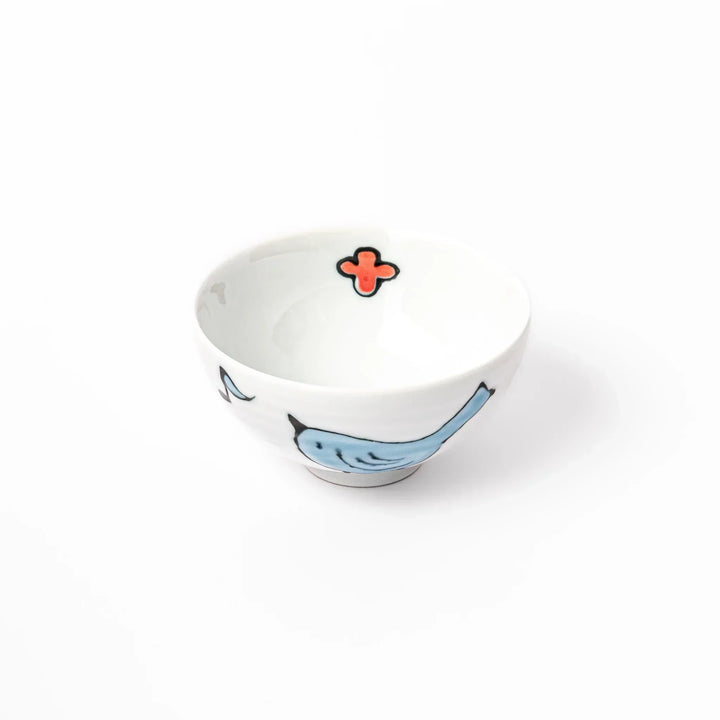 Children’s rice bowl with hand-painted blue bird and musical notes, adding cheer to everyday meals.