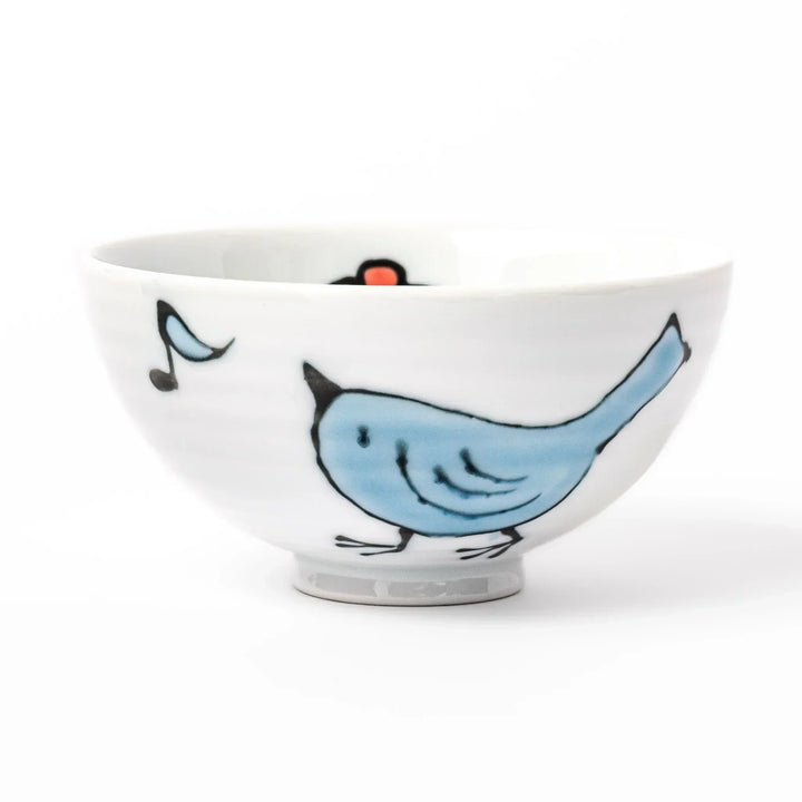 Children’s rice bowl with hand-painted blue bird and musical notes, adding cheer to everyday meals.