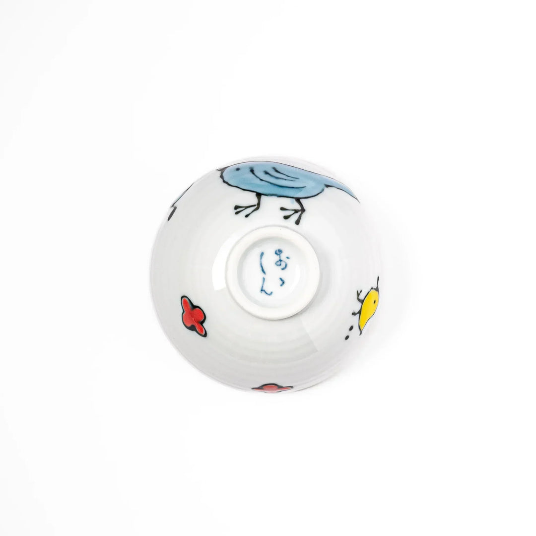 Children’s rice bowl with hand-painted blue bird and musical notes, adding cheer to everyday meals.