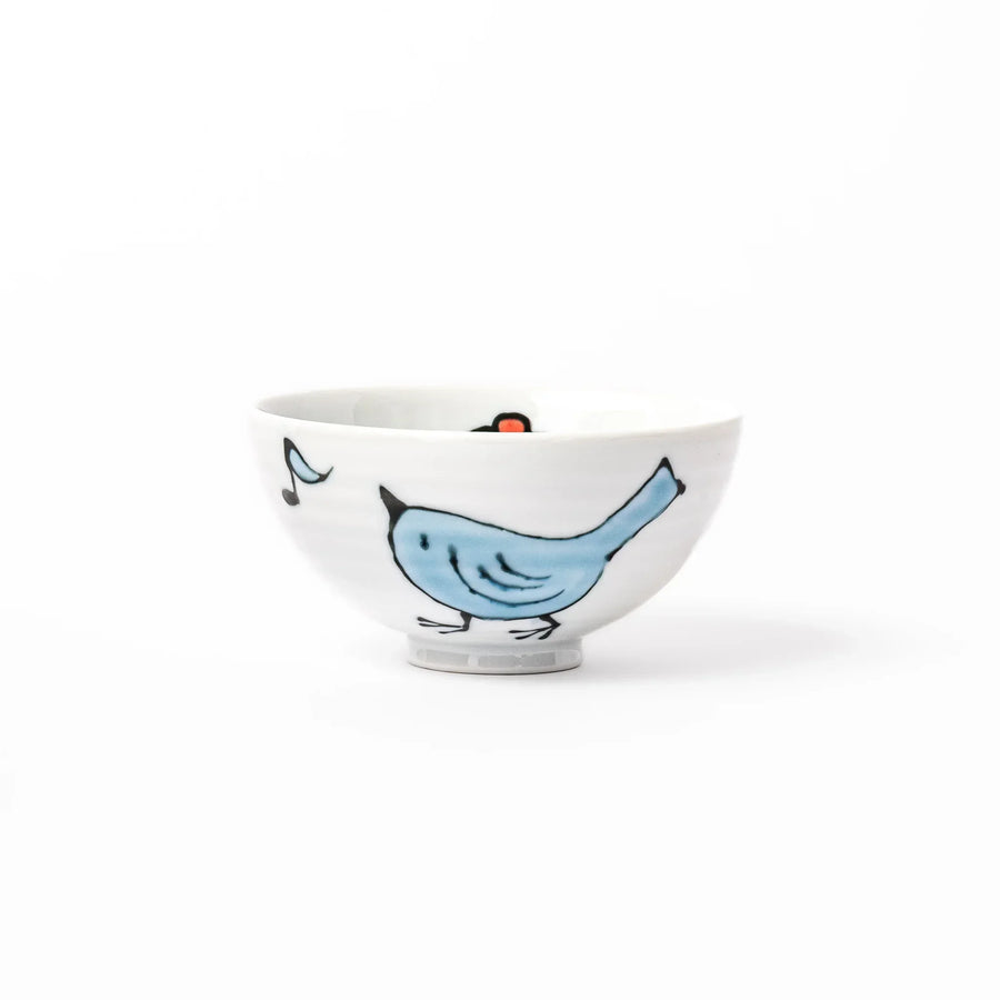 Children’s rice bowl with hand-painted blue bird and musical notes, adding cheer to everyday meals.