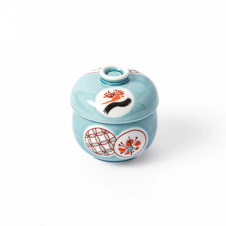 Lidded chawanmushi bowl with a glossy blue glaze and traditional red, black, and white circular patterns on lid and sides.