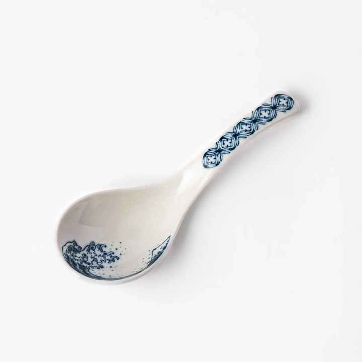 Japanese porcelain ramen spoon featuring Hokusai Great Wave and Mount Fuji design in classic blue and white style.