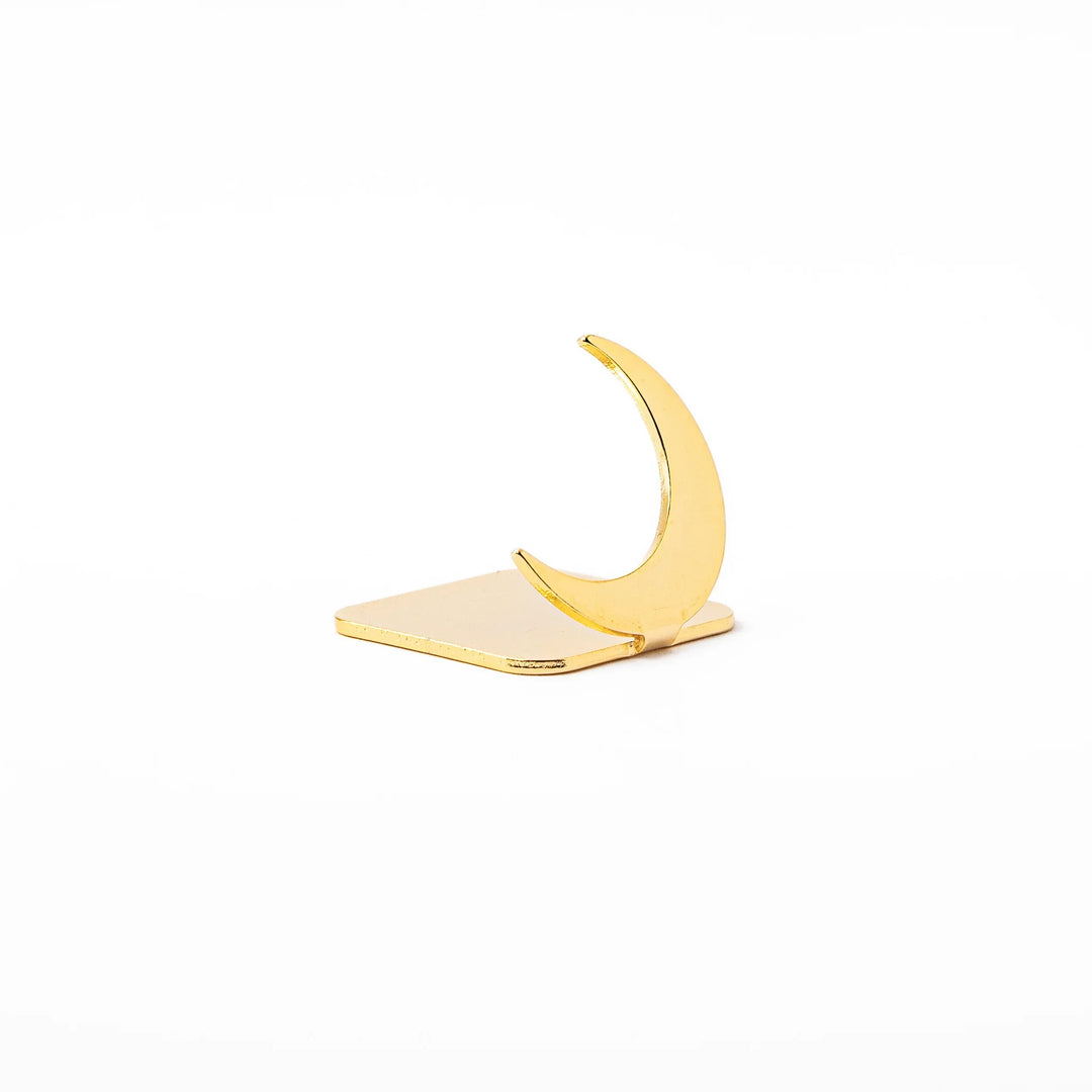 Celestial gold chopstick rest showing unique curved crescent moon design metallic elegant hashioki holder