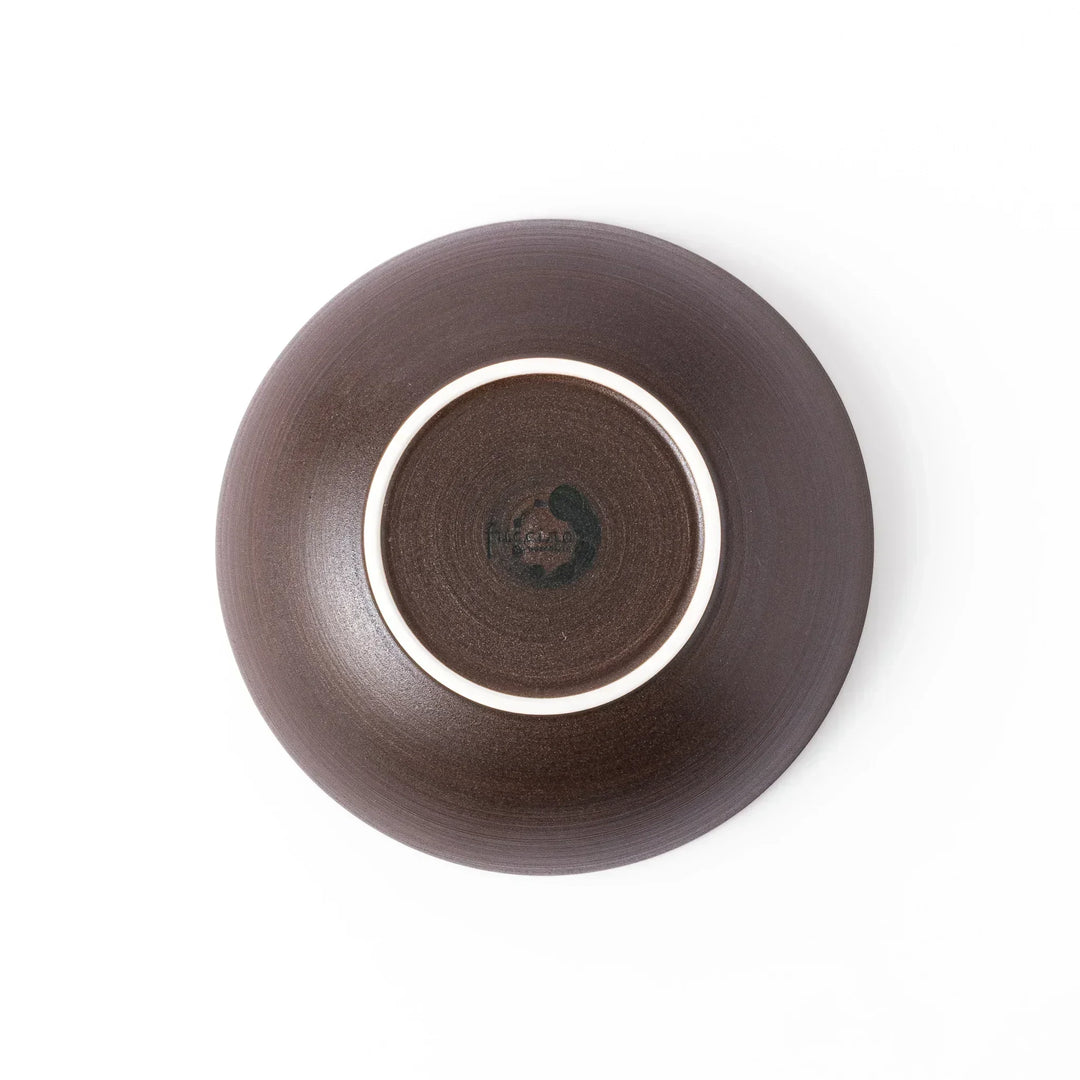 Matte brown ceramic bowl with a gently curved form and subtle textured finish, placed on a white background.