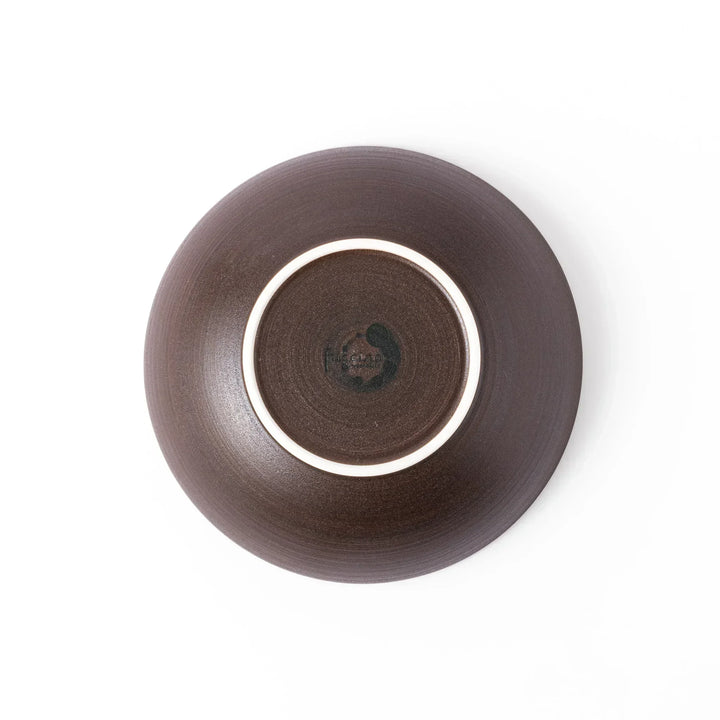 Matte brown ceramic bowl with a gently curved form and subtle textured finish, placed on a white background.