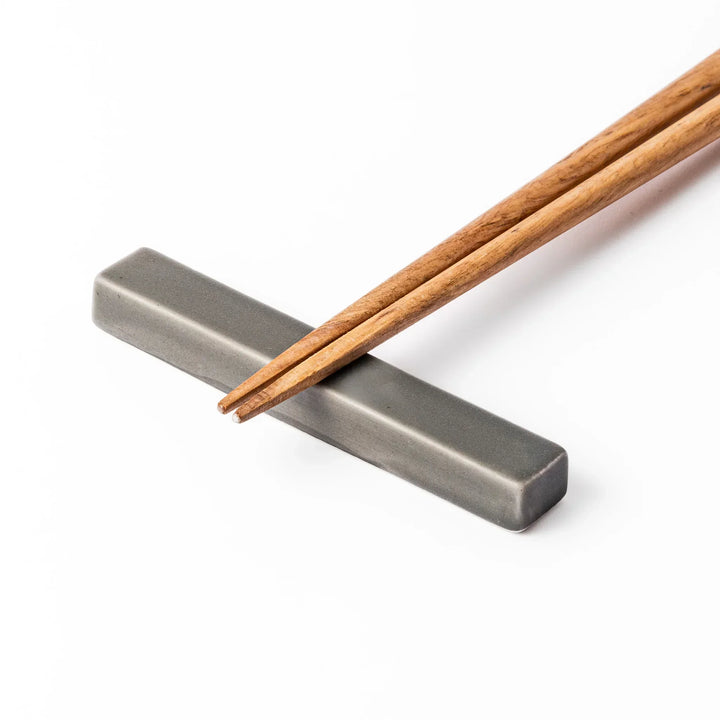 Rectangular ceramic chopstick rest in a soft gray Japandi tone with clean edges and a smooth matte finish