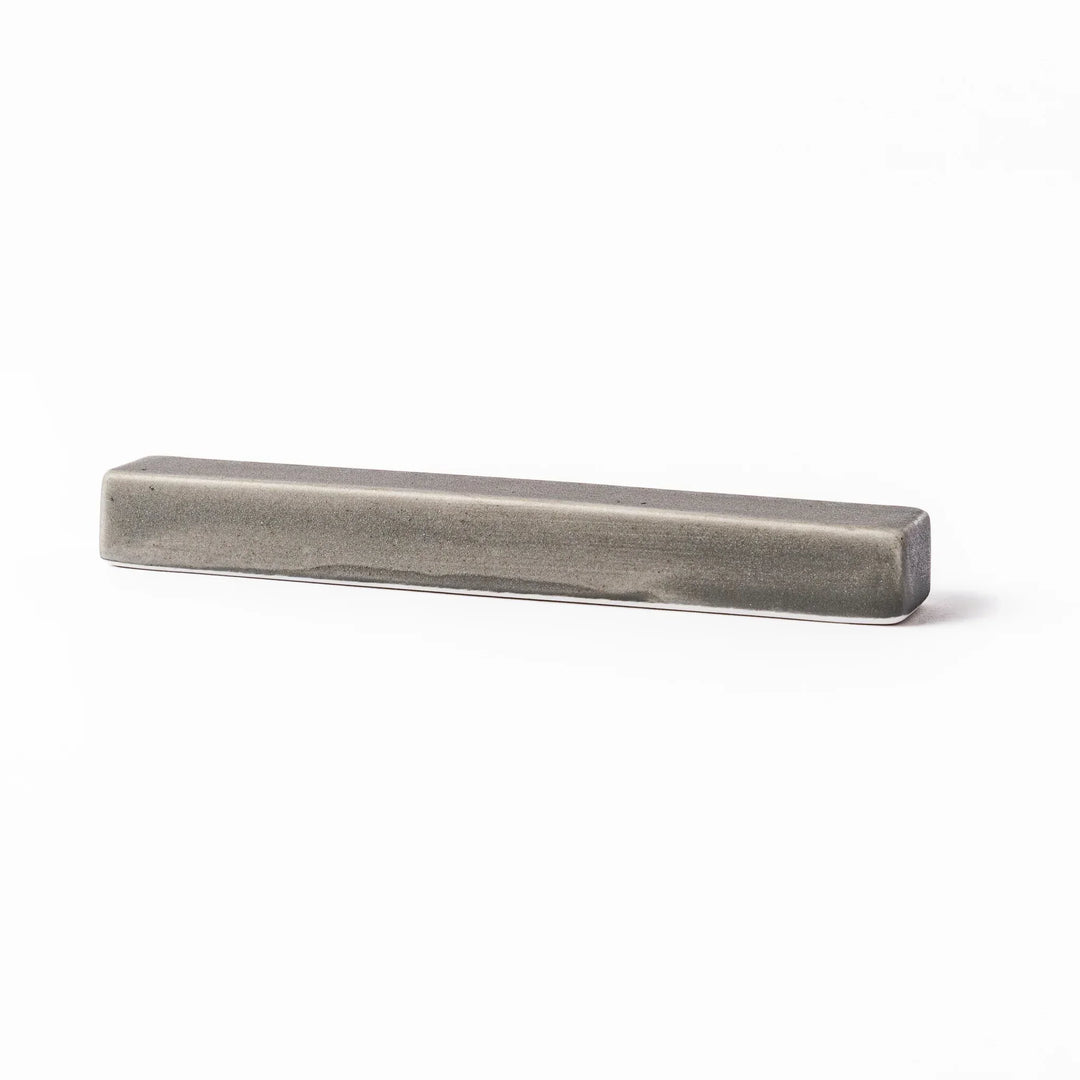 Rectangular ceramic chopstick rest in a soft gray Japandi tone with clean edges and a smooth matte finish
