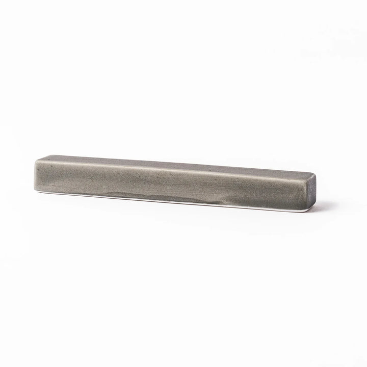 Rectangular ceramic chopstick rest in a soft gray Japandi tone with clean edges and a smooth matte finish