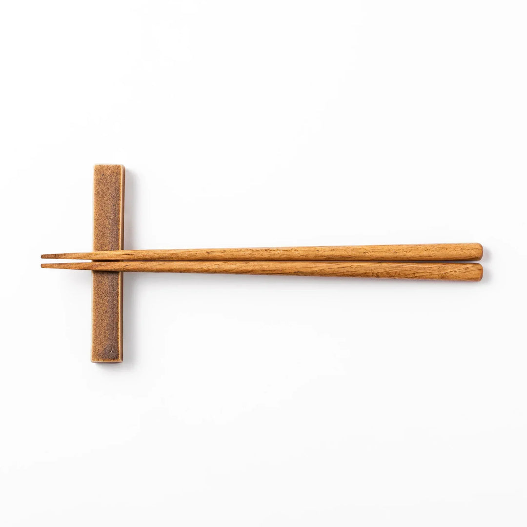 Rectangular ceramic chopstick rest in a warm beige Japandi tone with a minimalist form and smooth glazed finish