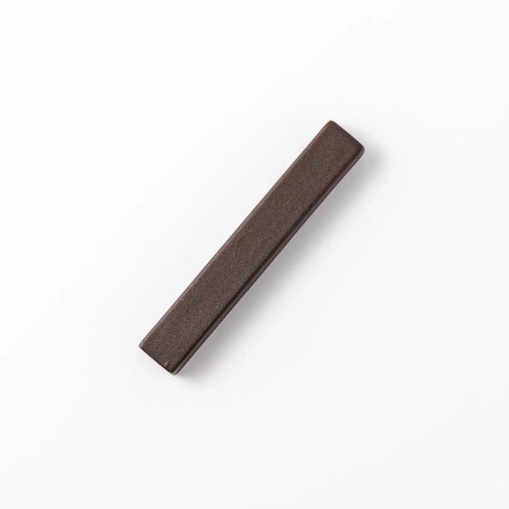 Matte brown rectangular chopstick rest with clean lines and minimalist Japandi style