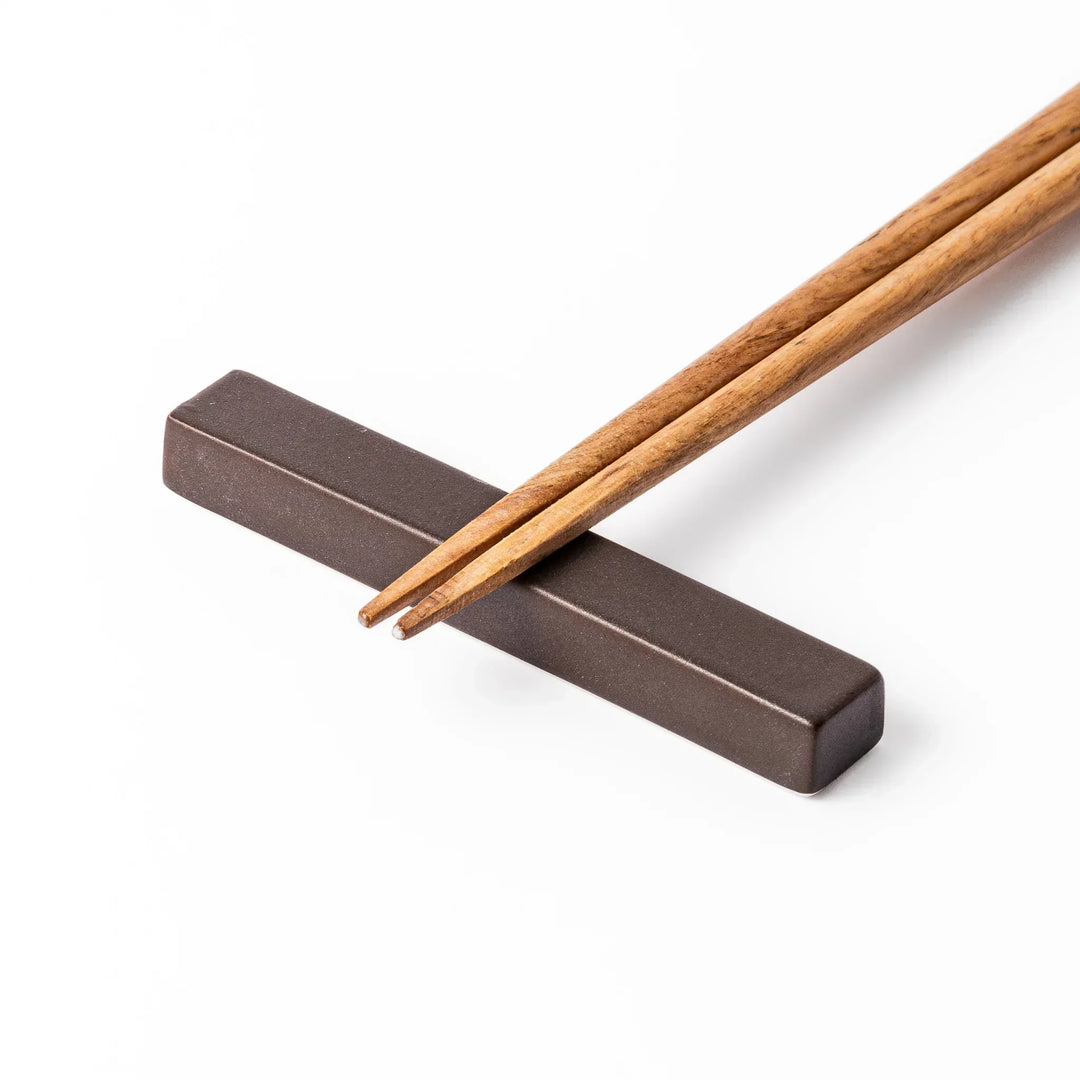 Matte brown rectangular chopstick rest with clean lines and minimalist Japandi style