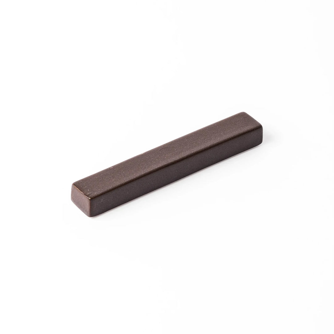 Matte brown rectangular chopstick rest with clean lines and minimalist Japandi style