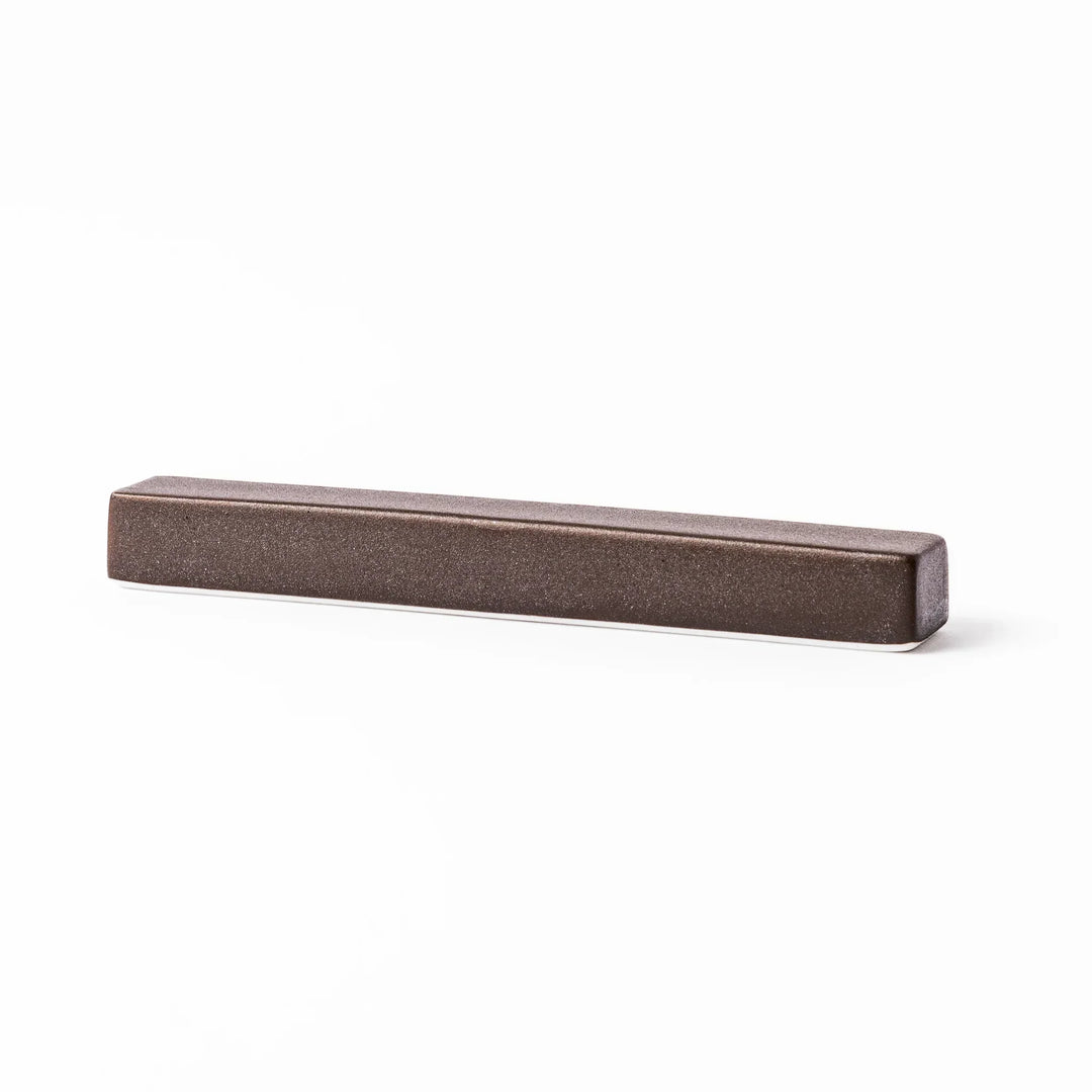 Matte brown rectangular chopstick rest with clean lines and minimalist Japandi style
