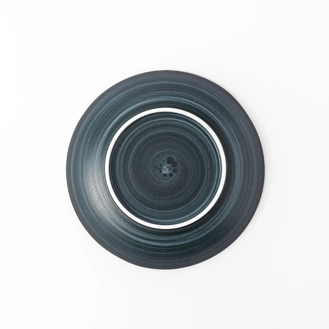Matte navy blue salad plate with swirling concentric texture and softly curved rim for a calm, modern feel.