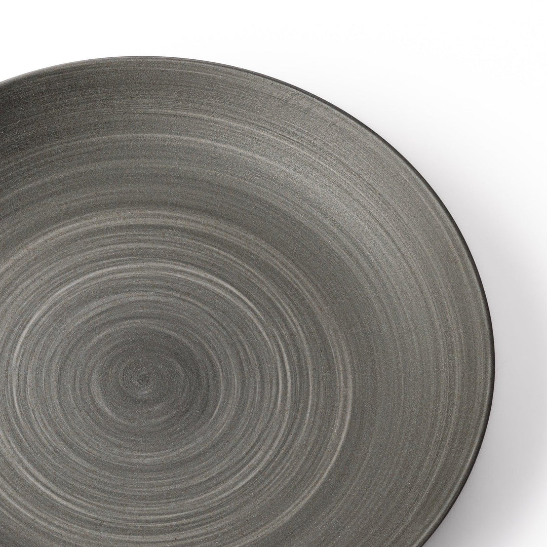 Matte gray salad plate with subtle concentric texture and gently curved sides for a modern Japandi look.