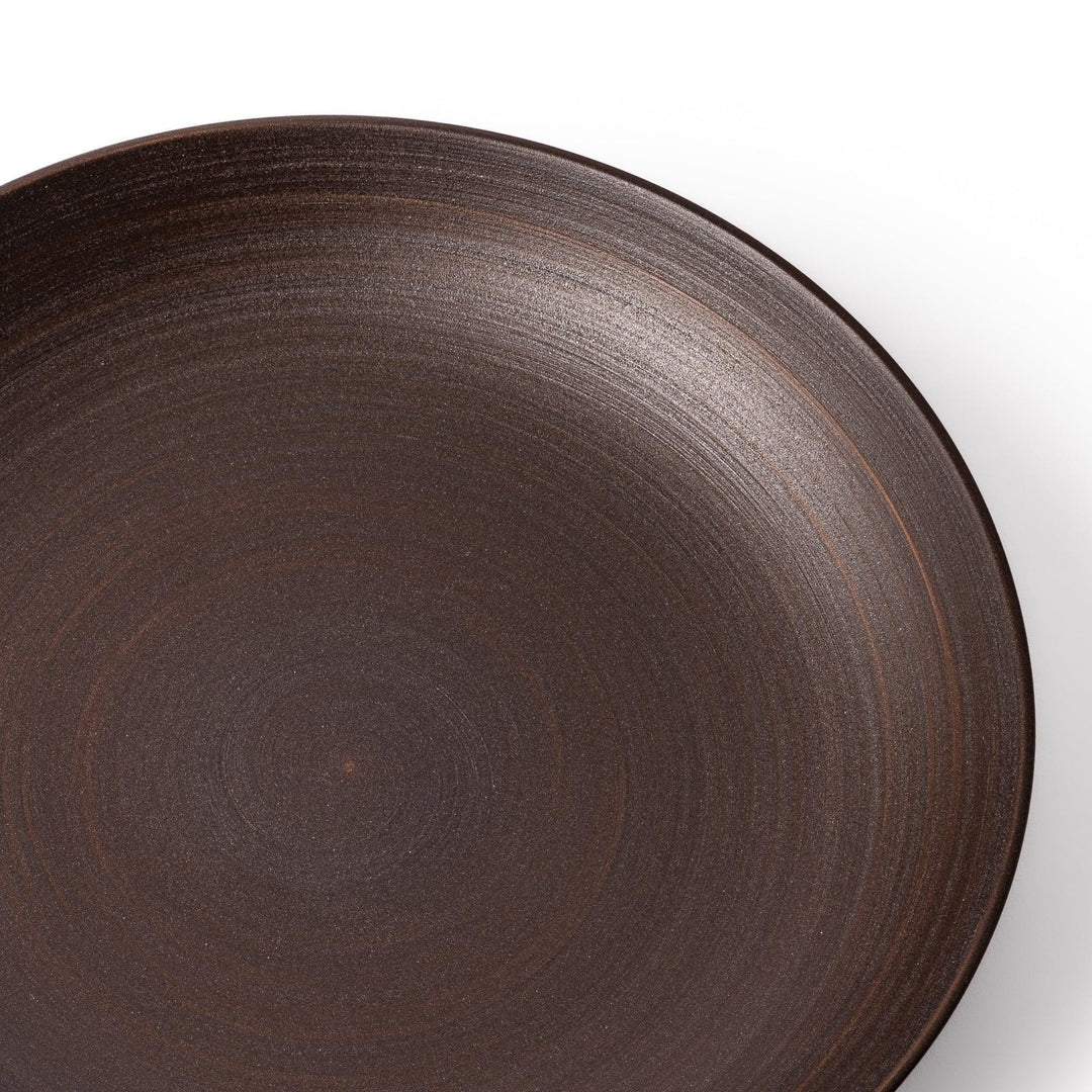 Matte brown ceramic salad plate with subtle swirl lines and a gently raised rim, perfect for modern Japandi table settings.