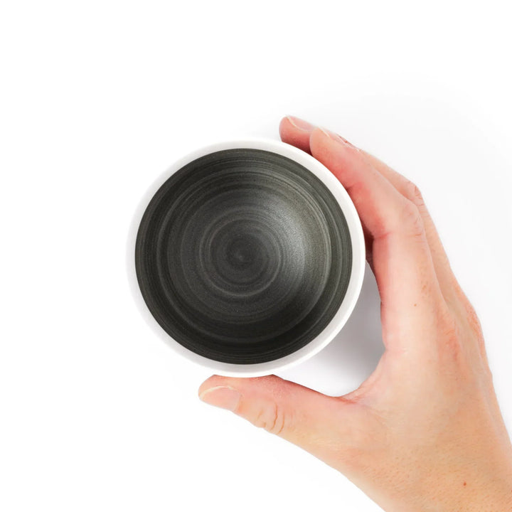 Two-tone tea cup with ivory rim and gray base, ideal for calm tea moments and Japandi tables.