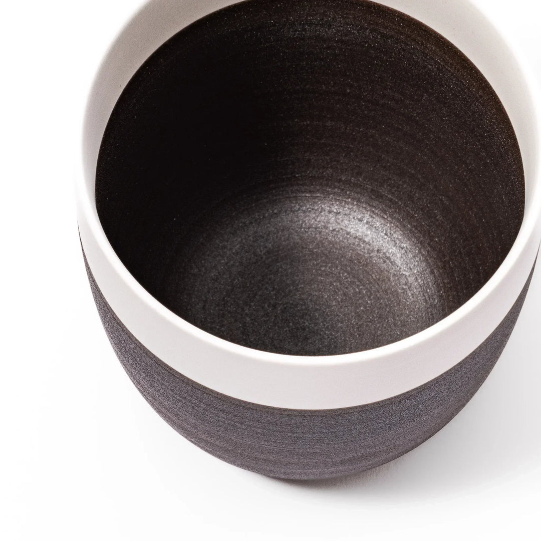 Two-tone tea cup with ivory rim and dark brown base, perfect for warm drinks and daily comfort.