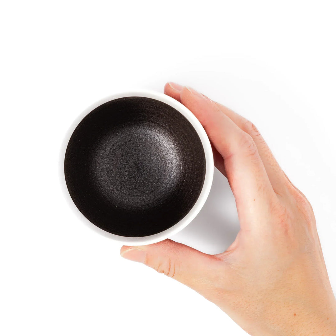 Two-tone tea cup with ivory rim and dark brown base, perfect for warm drinks and daily comfort.