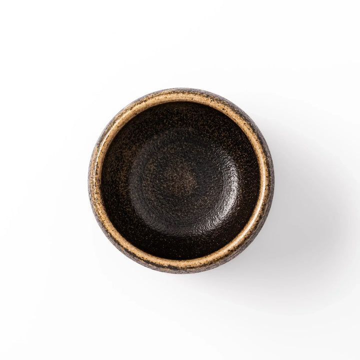 Dark brown ceramic rice storage bowl with lid and rustic texture for storing and serving cooked rice.
