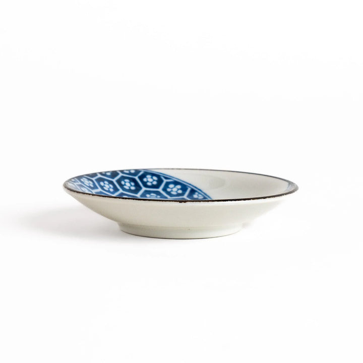 Small dinosaur pattern sauce plate with Japanese geometric motif for a playful dining table accent.