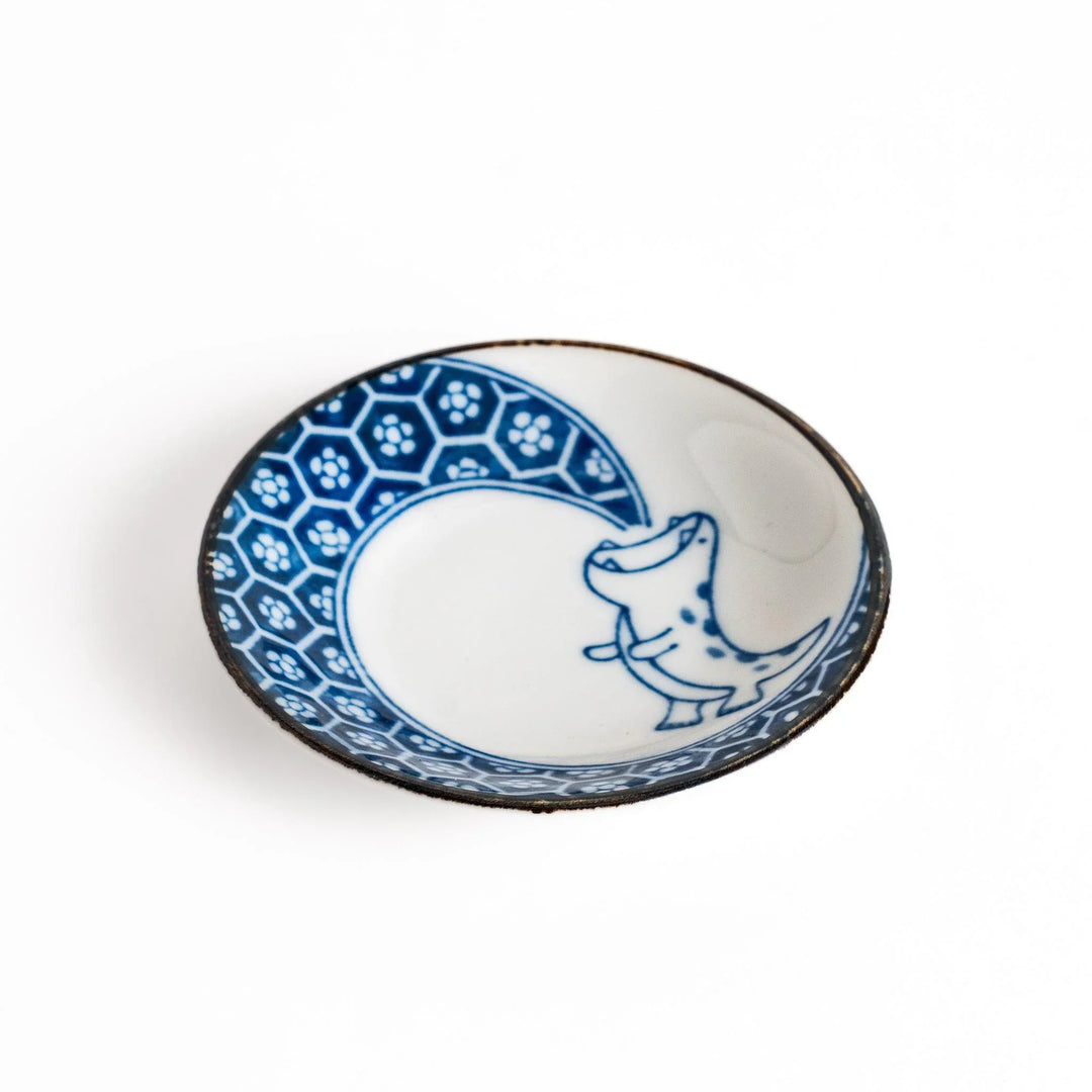 Small dinosaur pattern sauce plate with Japanese geometric motif for a playful dining table accent.