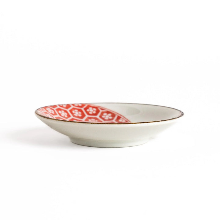Small dinosaur pattern sauce plate with Japanese geometric motif for a playful dining table accent.