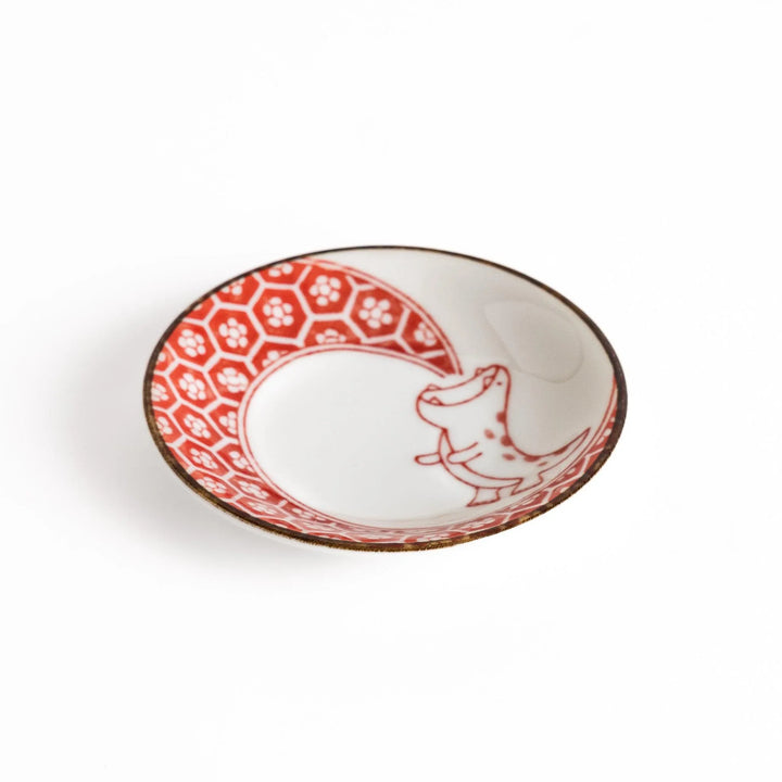 Small dinosaur pattern sauce plate with Japanese geometric motif for a playful dining table accent.