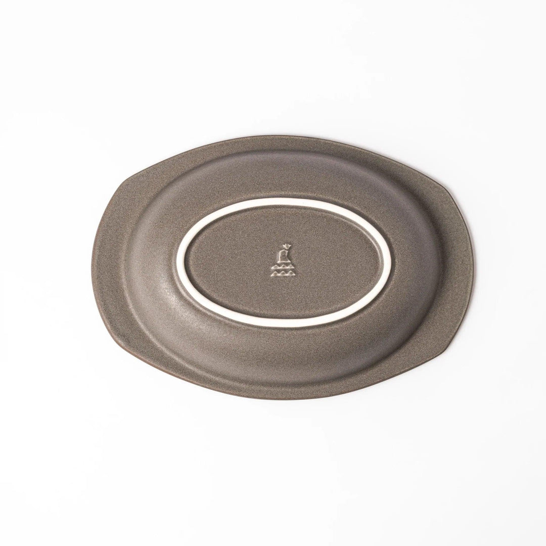 Gray Japanese oval ceramic curry plate with wide rim and raised sides for serving rice curry or stew.