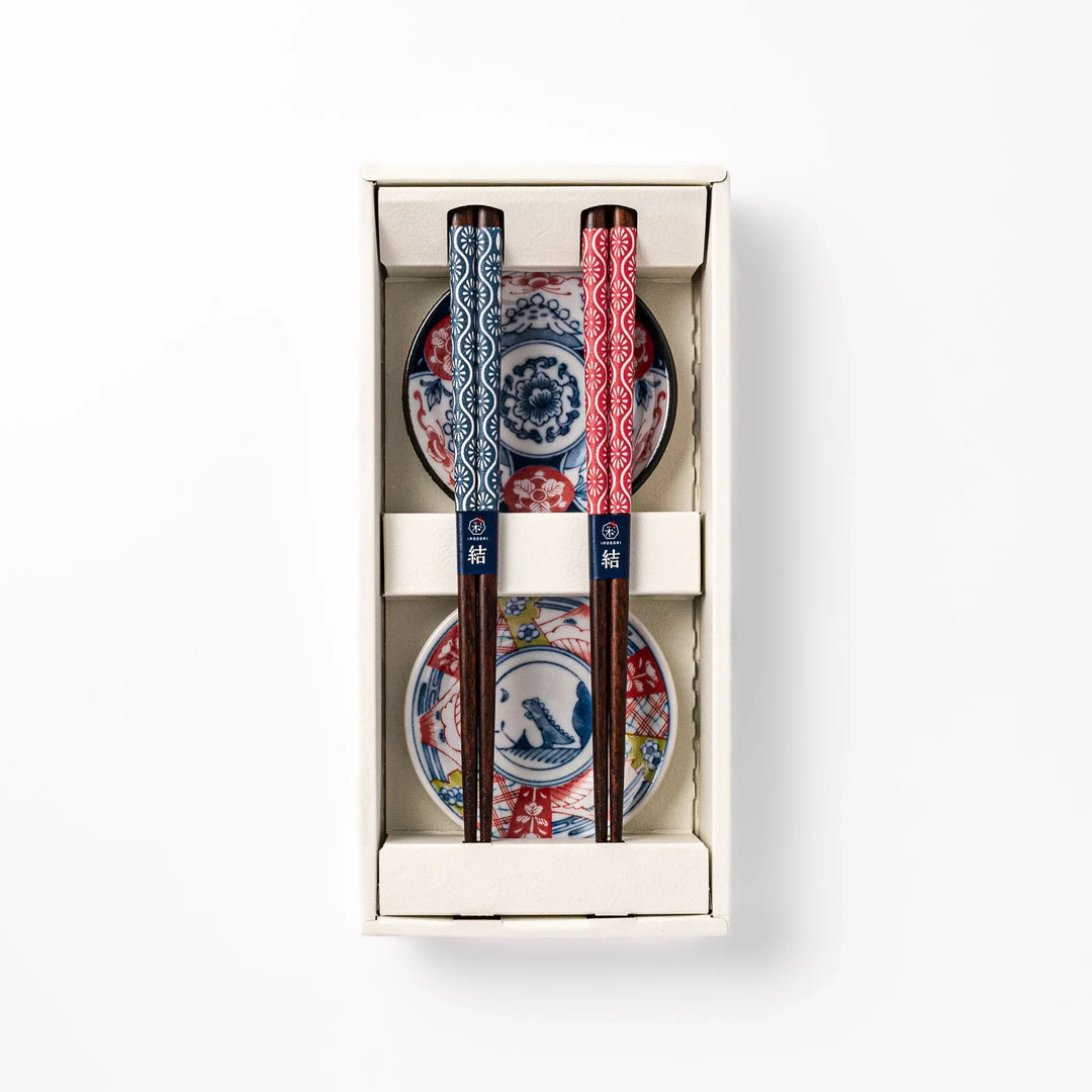 Japanese Edo-style chopsticks and sauce dish set featuring red and blue patterns with playful dinosaur motif gift box.