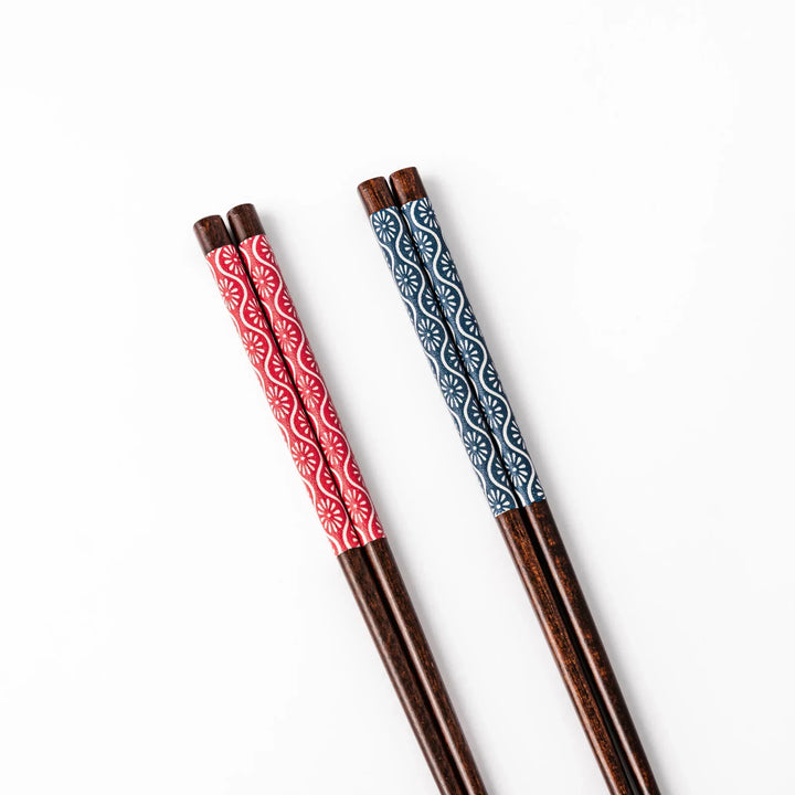 Japanese Edo-style chopsticks and sauce dish set featuring red and blue patterns with playful dinosaur motif gift box.