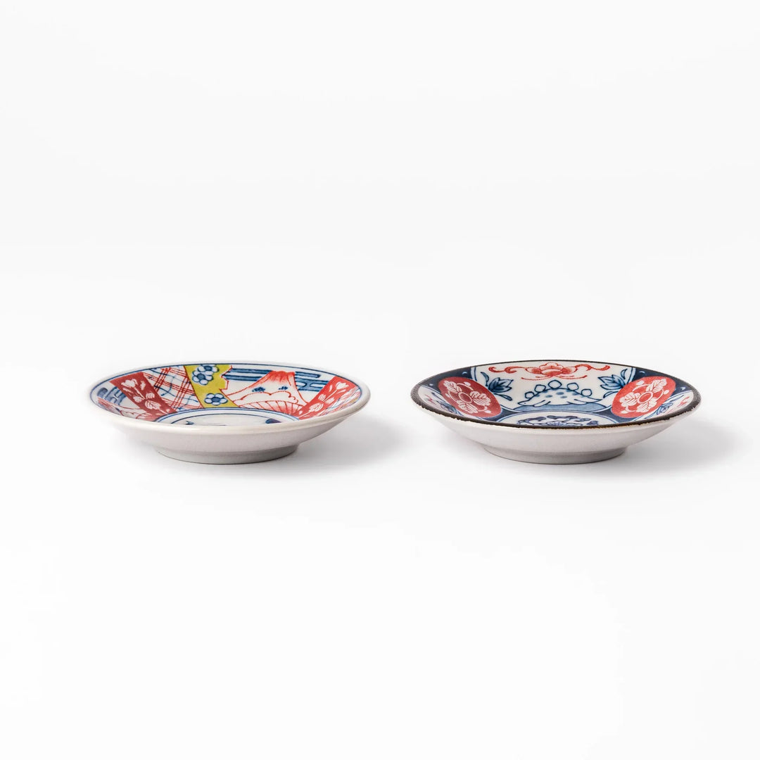 Japanese Edo-style chopsticks and sauce dish set featuring red and blue patterns with playful dinosaur motif gift box.