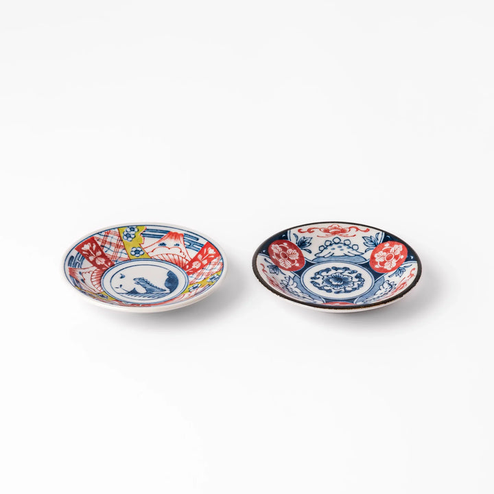 Japanese Edo-style chopsticks and sauce dish set featuring red and blue patterns with playful dinosaur motif gift box.