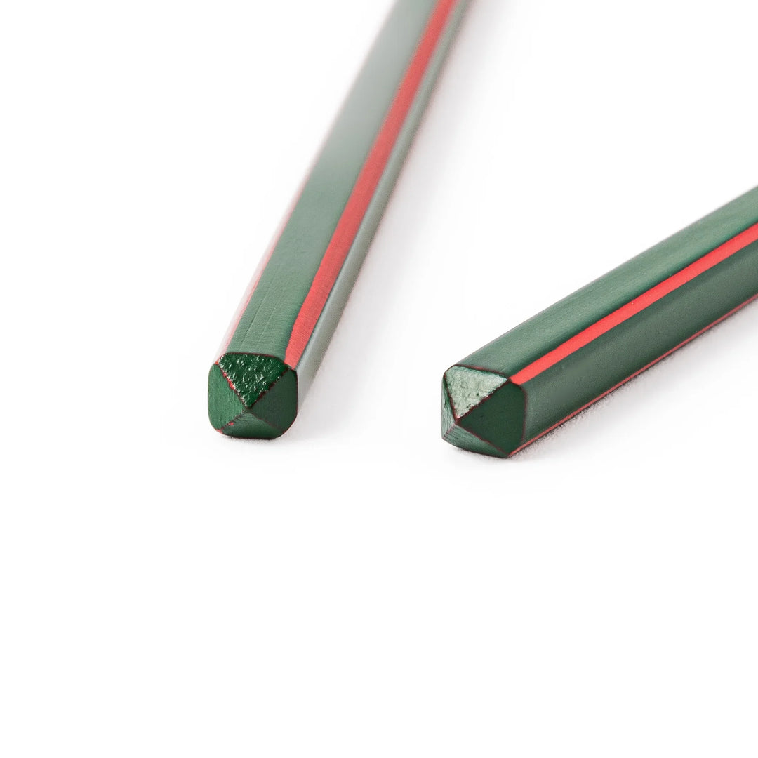 Fine tip Japanese bamboo chopsticks featuring a green handle with red accents and a natural bamboo finish